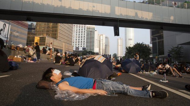 Protesters sleep on the streets outside the Hong Kong Government Complex on 30 September 2014 in Hong Kong