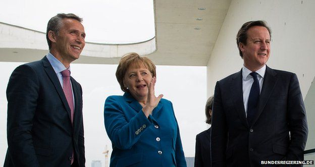 Jens Stoltenberg (left) with Angela Merkel and David Cameron in Berlin, 7 June 2012