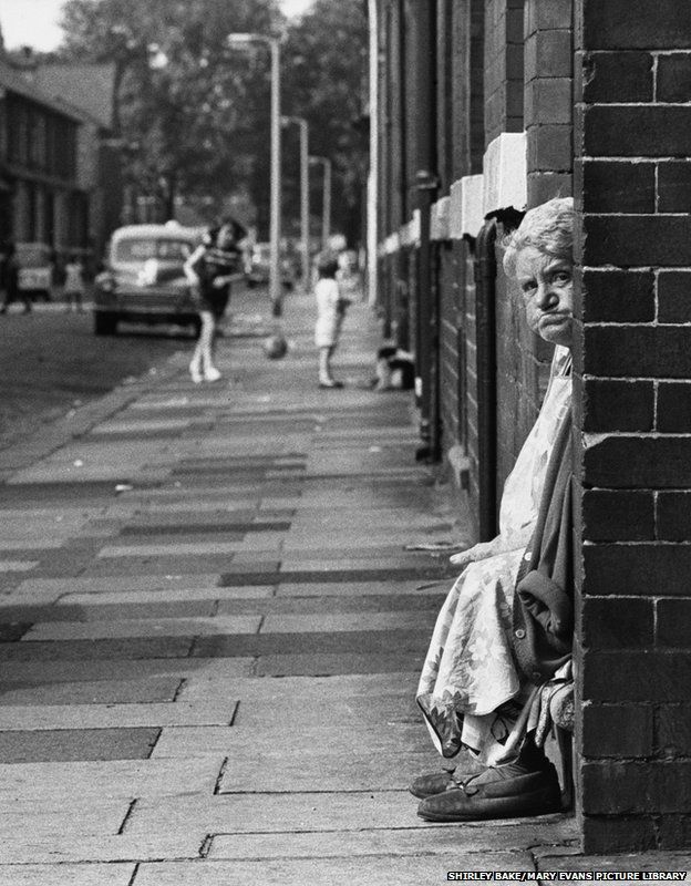 Old Lady sitting in a doorway, Manchester 1968