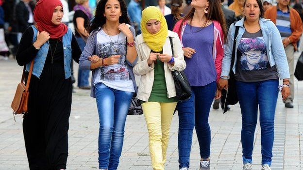 Tunisians walking in central Tunis, Tunisia - November 2013