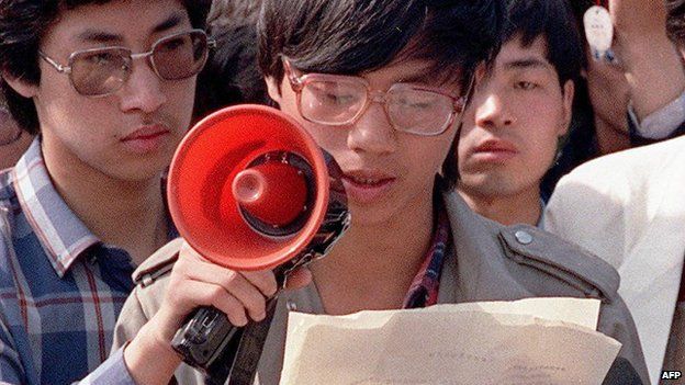 File photo from 1 May 1989 shows Chinese student-leader Wang Dan addressing foreign correspondents in Beijing
