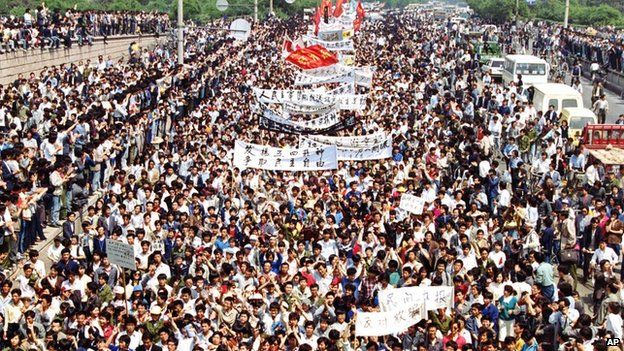 Students from local colleges and universities march to Tiananmen Square, Beijing, to demonstrate for government reform