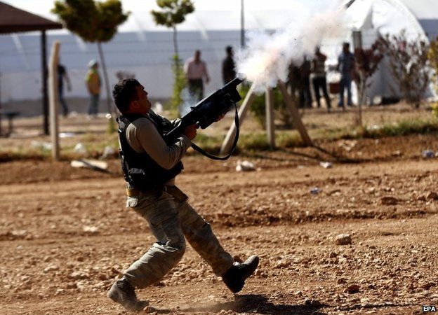 Turkish gendarme fires tear gas - 4 October
