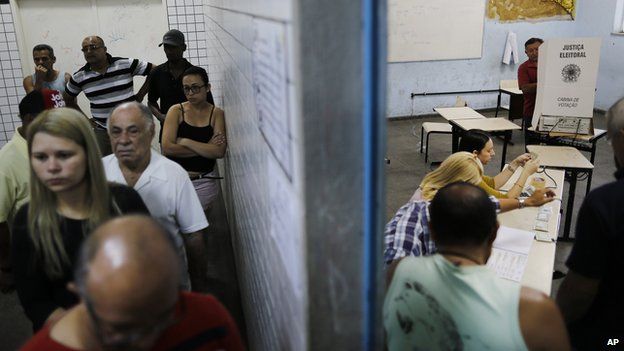 general elections inside a school in the Nova Holanda slum located in the Complexo da Mare in Rio de Janeiro, Brazil, Sunday, Oct. 5, 2014