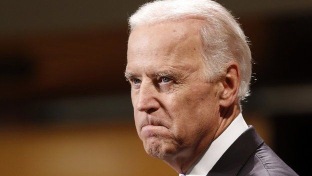 Vice President Joe Biden bites his lip while speaking to students faculty and staff at Harvard University's Kennedy School of Government in Cambridge, Mass. on 2 October 2014.
