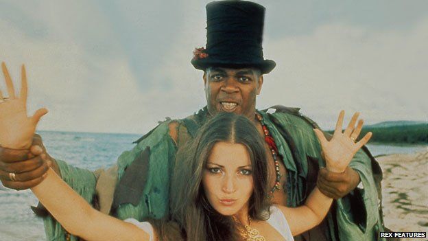 Geoffrey Holder with Jane Seymour in a promotional image for Live and Let Die