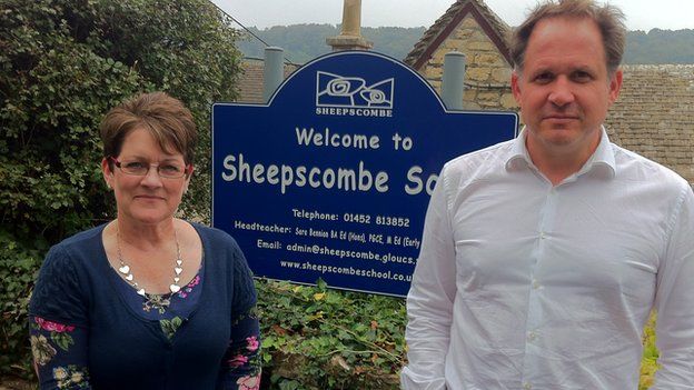 Sara Bennion and Henry Dimbleby outside Sheepscombe School