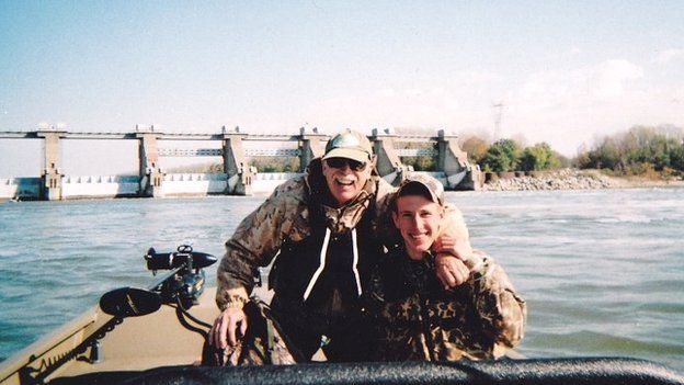 Peter Kassig fishing with his father, Ed Kassig, near the Cannelton Dam on the Ohio River in Indiana - 2011