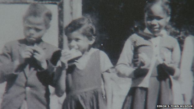 Margaret (middle) in her school uniform