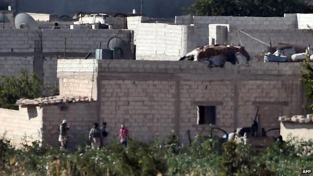 Suspected IS militants in Kobane, 8 Oct