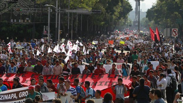 Activists march in support of the 43 missing students in downtown Mexico City (8 October 2014)