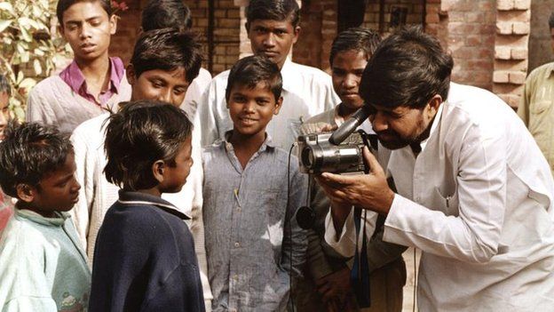 File picture from 1996 of Kailash Satyarthi shooting a video