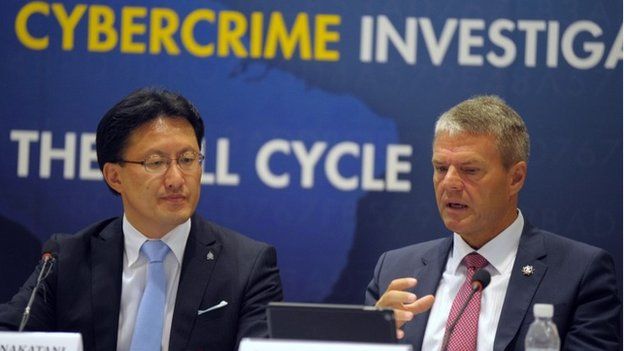 Troles Oerting and executive director of Interpol Noboru Nakatani