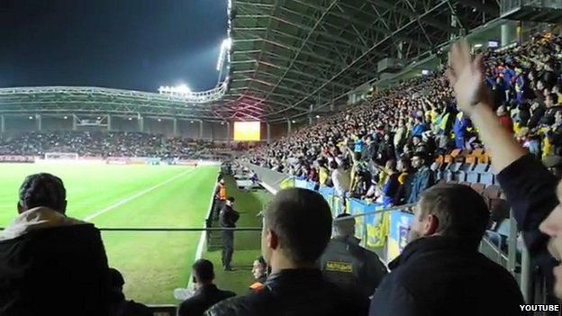 Fans chant at the Ukraine-Belarus Euro 2016 match in Borisov, Belarus, on 9 October 2014