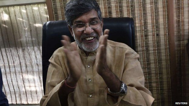 Indian child rights activist Kailash Satyarthi gestures as he speaks with the media at his office in New Delhi - 10 October 2014