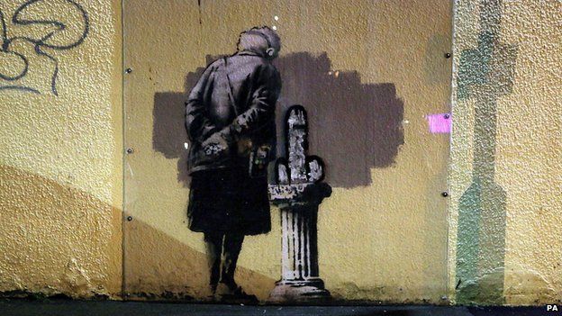 Vandalised Banksy image