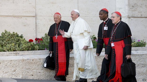 Pope Francis arrives with, from left, Chilean Cardinal Ricardo Ezzati Andrello, Haitian Cardinal Chibly Langlois, and Spanish Cardinal Lluis Martinez Sistach, 9 October