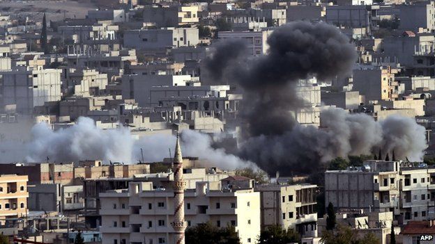 Smoke from an air strike on the Syrian town of Kobane on 13 October 2014