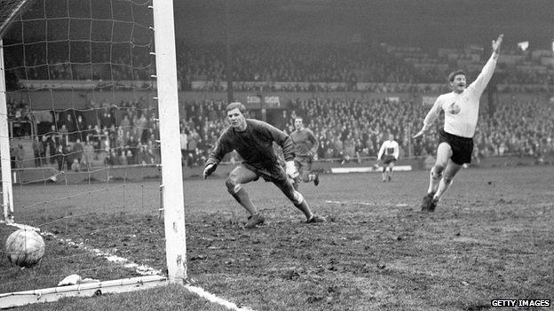 Derek Kevan celebrating after scoring for Luton against Bristol Rovers, who included goalkeeper Larry Taylor, in the 1960s