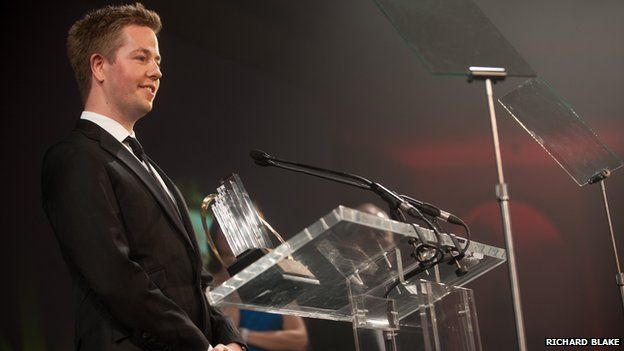 Mark Pearson picking up his award for Ernst & Young young entrepreneur of the year 2011