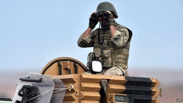 Turkish soldier watching events in Kobane