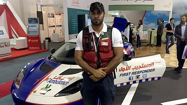 Dubai paramedic Zaid Al Mamari in front of the new ambulance