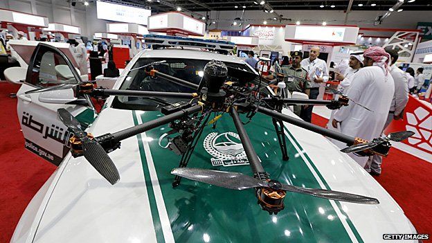 One of Dubai's high performance police cars, with a surveillance drone perched on the bonnet