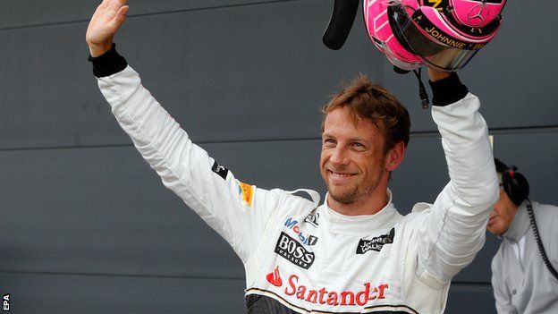 Jenson Button celebrates after taking third position in the qualifying session at Silverstone