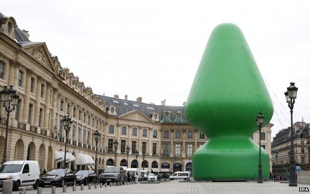 The sculpture entitled Tree by US artist Paul McCarthy on display at the Place Vendome in Paris, France, 16 October