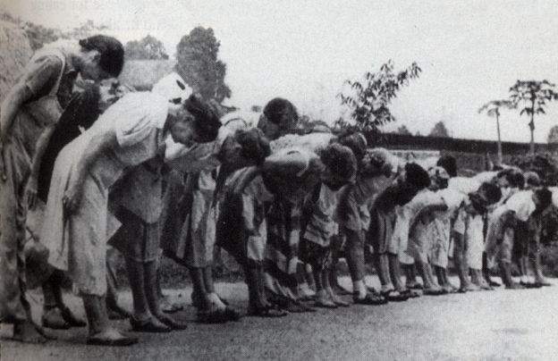 Women bowing