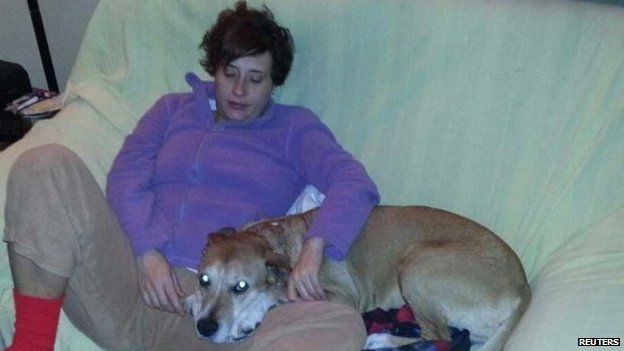Teresa Romero Ramos, the Spanish nurse who contracted Ebola, is pictured with her dog Excalibur in this undated handout photo provided on 8 October 2014