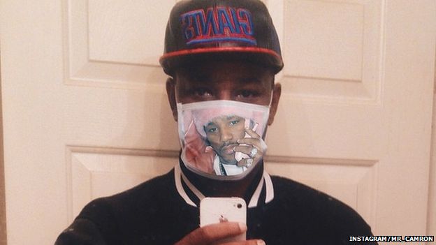 Cam'ron wearing his Ebola mask