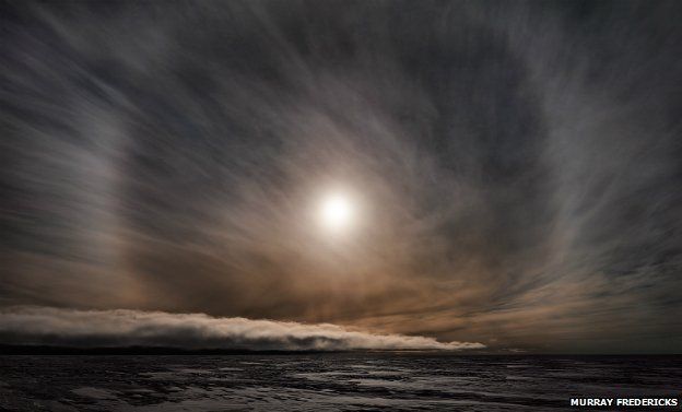 From Murray Fredericks' 'Topophilia' series: Icesheet #2564, late sun with 22˚ halo - 2013
