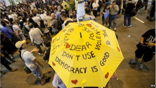 Pro-democracy protesters gather to discuss politics in the street in Mong Kok, Kowloon, Hong Kong, China, 20 October 2014.