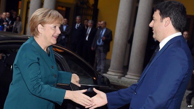 Matteo Renzi with Germany's Chancellor Angela Merkel in Milan (17 Oct)