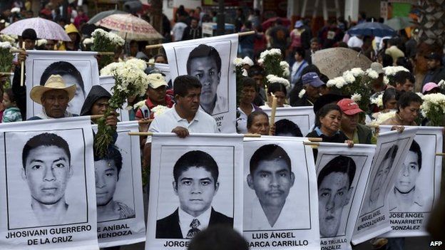 Parents and relatives of the 43 missing students arrive for a mass at Basilica of Guadalupe in Mexico City on 19 October, 2014