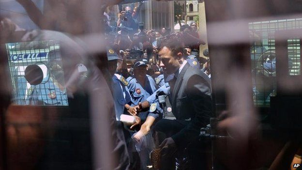 Oscar Pistorius leaves the Pretoria High Court, 21 Oct