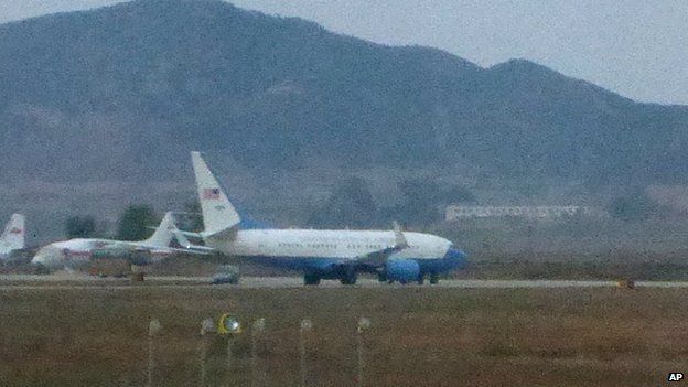 What appears to be a United States Air Force passenger jet, right, is parked on the tarmac of Sunan International Airport in Pyongyang, North Korea, on 21 October 2014.