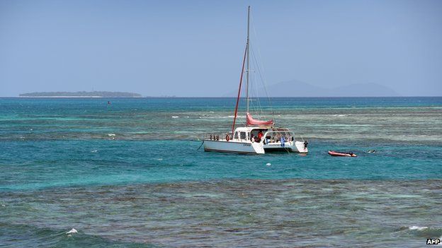 A photo taken on 22 September 2014 shows a tourist boat anchored on Australia's Great Barrier Reef