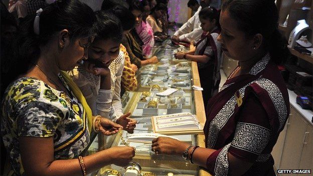 Indian women choosing jewellery