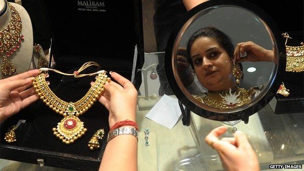 Indian woman trying on jewellery