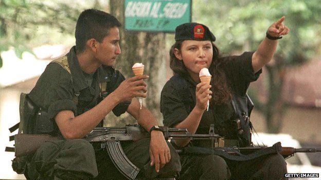 Guerrillas eat ice-cream in San Vicente del Caguan on 29 June, 2000.