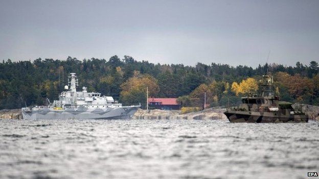 A Swedish minesweeper and guard boat searching for the mystery vessel