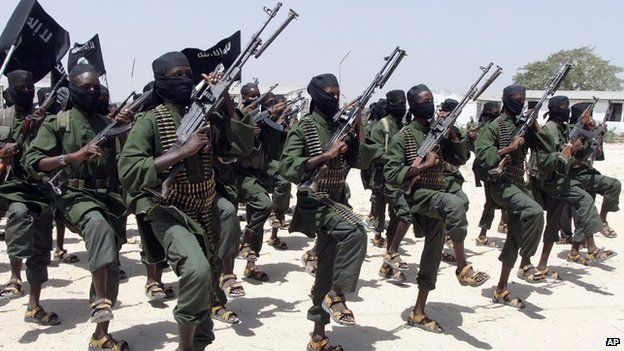 Hundreds of newly trained al-Shabab fighters perform military exercises in the Lafofe area 18km south of Mogadishu, Somalia, taken on 17 February 2011