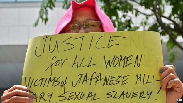 A former "comfort woman" demands justice near the parliament in Tokyo