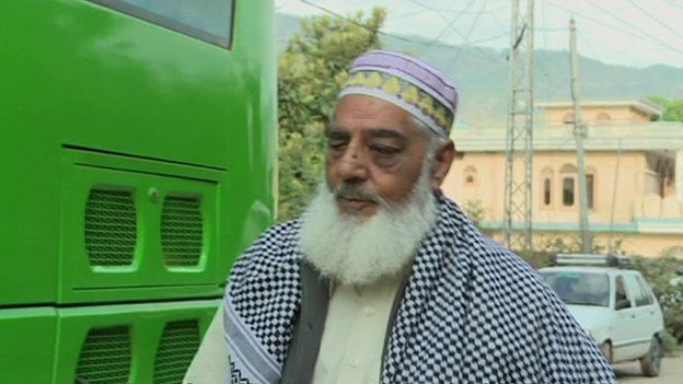 Noor Hussain prepares to board the bus