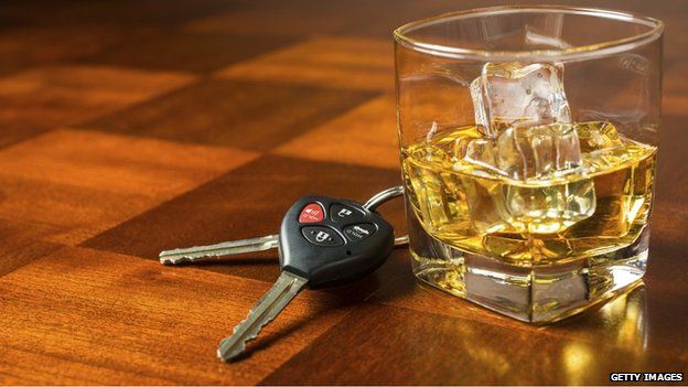 glass of whisky and car keys