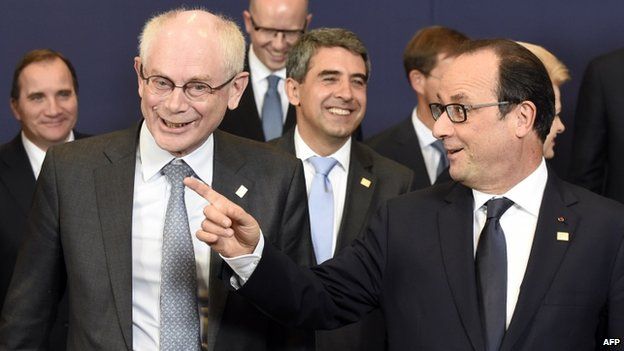 European Council President Herman Van Rompuy (left) listens to French President Francois Hollande (right)