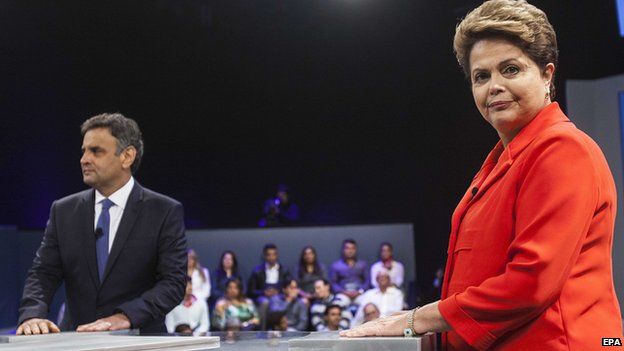 Brazilian presidential candidate and incumbent President Dilma Rousseff (R) and social democratic candidate Aecio Neves (L) attend a TV debate in Rio de Janeiro, Brazil, 24 October 2014