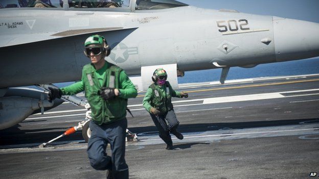 US sailors on aircraft carrier Carl Vinson - 19 October